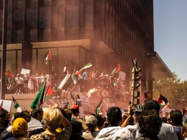 Photo by Chrisna Senatus: https://www.pexels.com/photo/people-protesting-with-palestinian-flags-7918088/