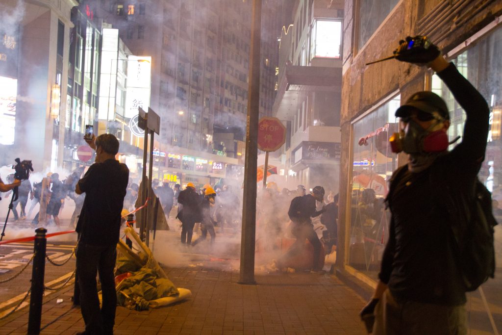 Photo by LT Chan: https://www.pexels.com/photo/man-wearing-gas-mask-standing-beside-store-facade-2833366/