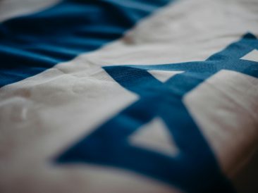 Photo by cottonbro studio: https://www.pexels.com/photo/close-up-of-the-flag-of-israel-4033852/