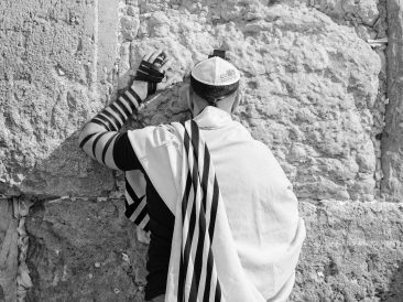 Photo by Marik Elikishvili: https://www.pexels.com/photo/anonymous-jewish-man-in-traditional-wear-praying-near-old-wall-4231037/