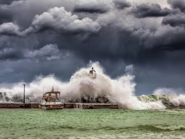 Photo by GEORGE DESIPRIS: https://www.pexels.com/photo/big-waves-under-cloudy-sky-753619/