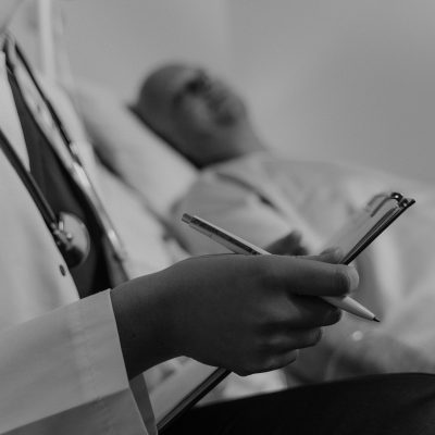 Photo by Tima Miroshnichenko: https://www.pexels.com/photo/doctor-holding-a-medical-chart-sitting-beside-a-patient-6010779/