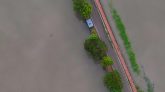 Photo by Raj Manohar: https://www.pexels.com/photo/aerial-view-of-flooded-road-surrounded-by-water-28428673/