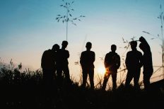 Photo by Afta Putta Gunawan: https://www.pexels.com/photo/silhouette-group-of-people-standing-on-grass-field-1250346/