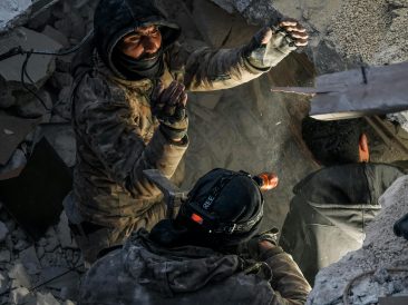 Photo by Mohammed Soufy: https://www.pexels.com/photo/photo-of-soldiers-amid-debris-15558852/