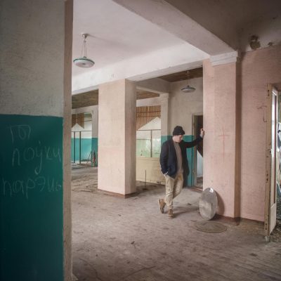 Photo by Alex Sever: https://www.pexels.com/photo/a-man-standing-in-an-abandoned-building-14799927/